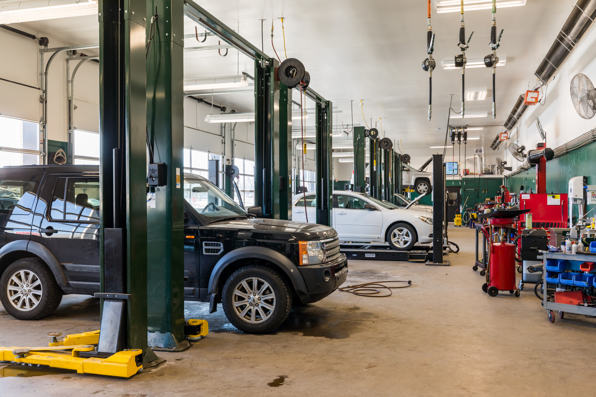 Vehicles in the CBAC garage bays undergoing maintenance